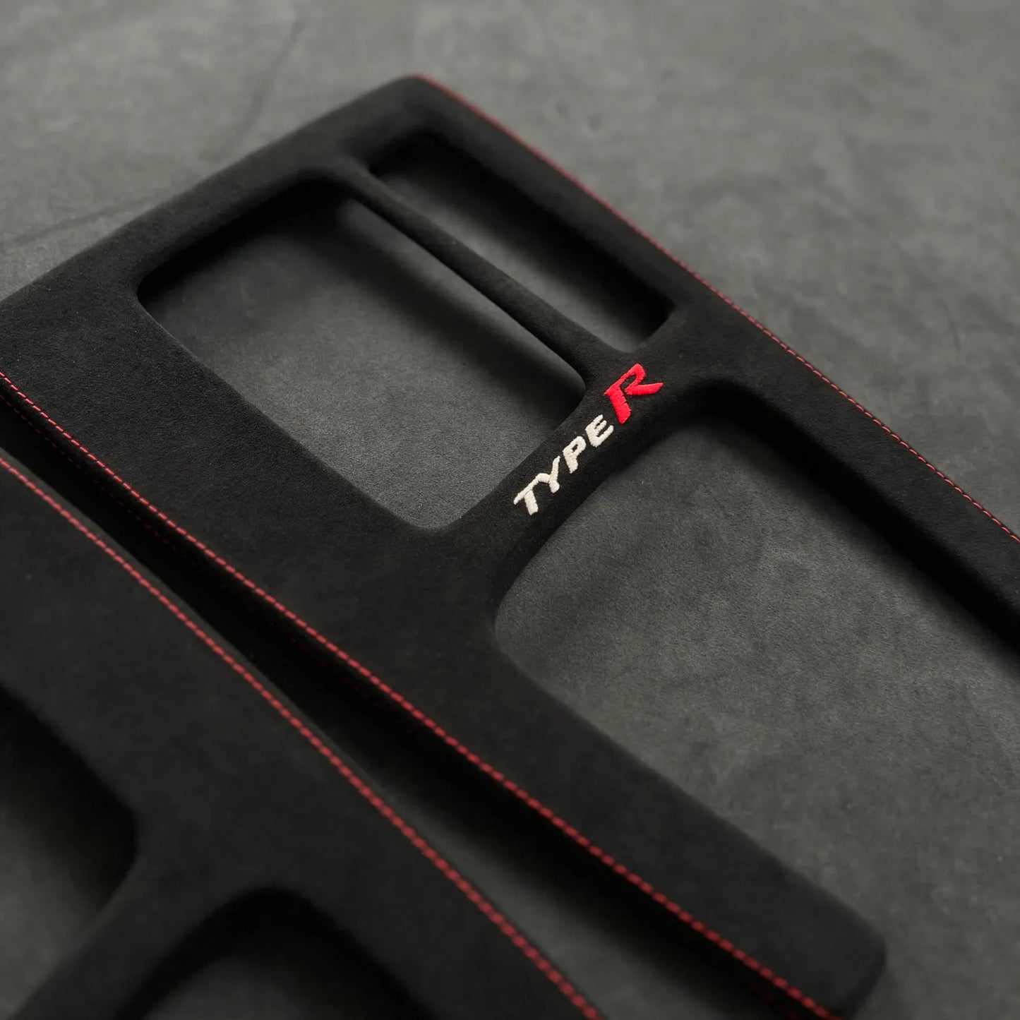 Side view of Civic Type R FL5 center console Alcantara wrap, displaying sleek sporty styling for both LHD & RHD interiors.
