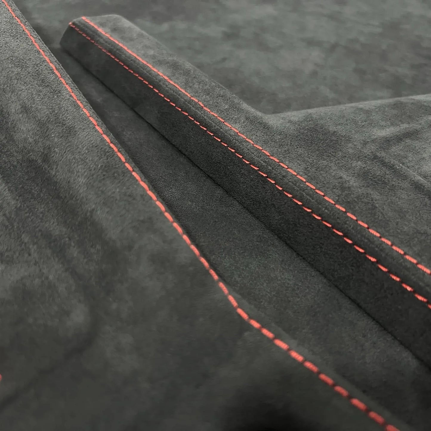 Upgrade Golf MK7/7.5 and MK8/8.5 interiors with Alcantara or leather gear shift panel cover, protects OEM plastic, enhances tactile feel and sporty aesthetics.