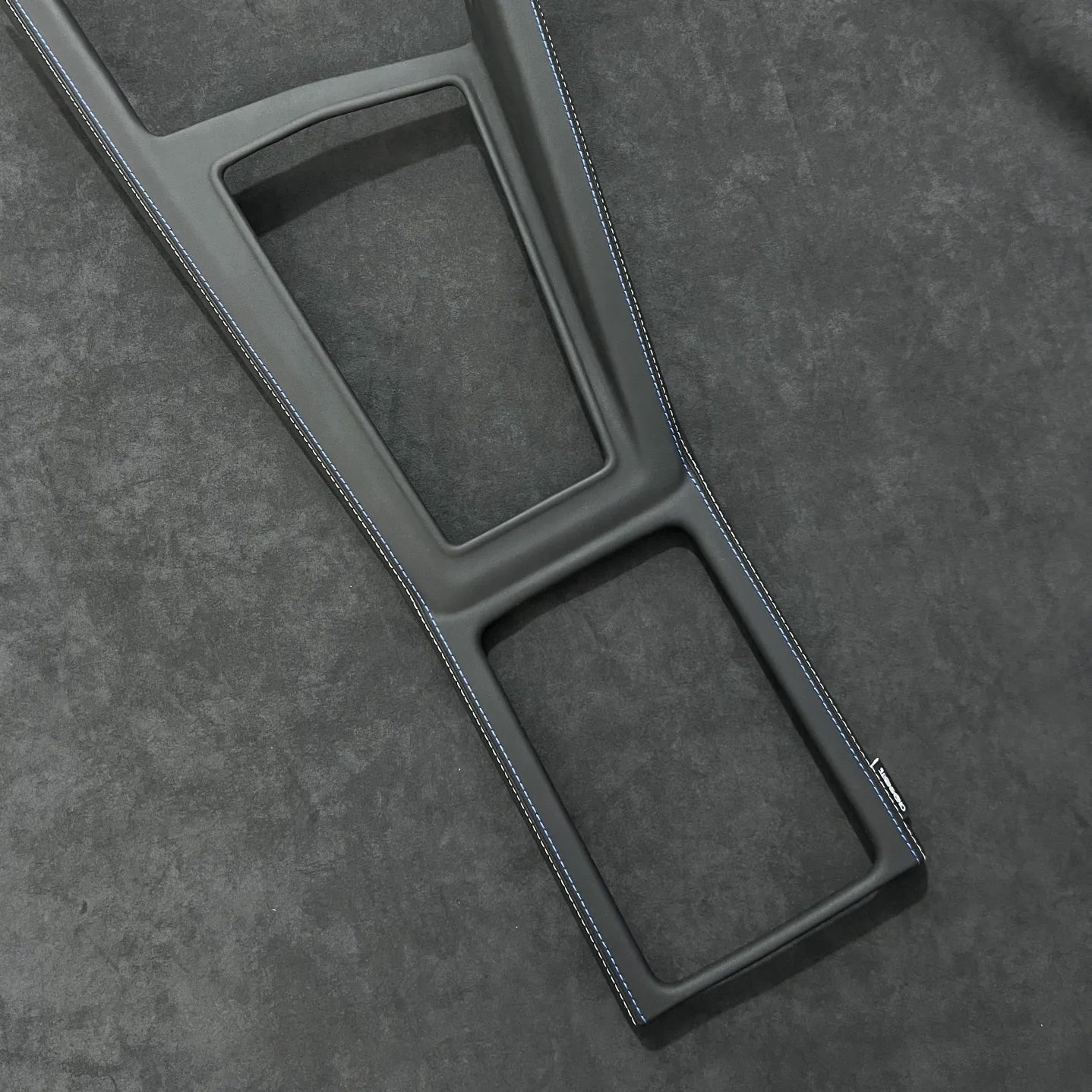 Gear shift panel cover for Golf GTI and R with red or blue stitching options to match interior styling.