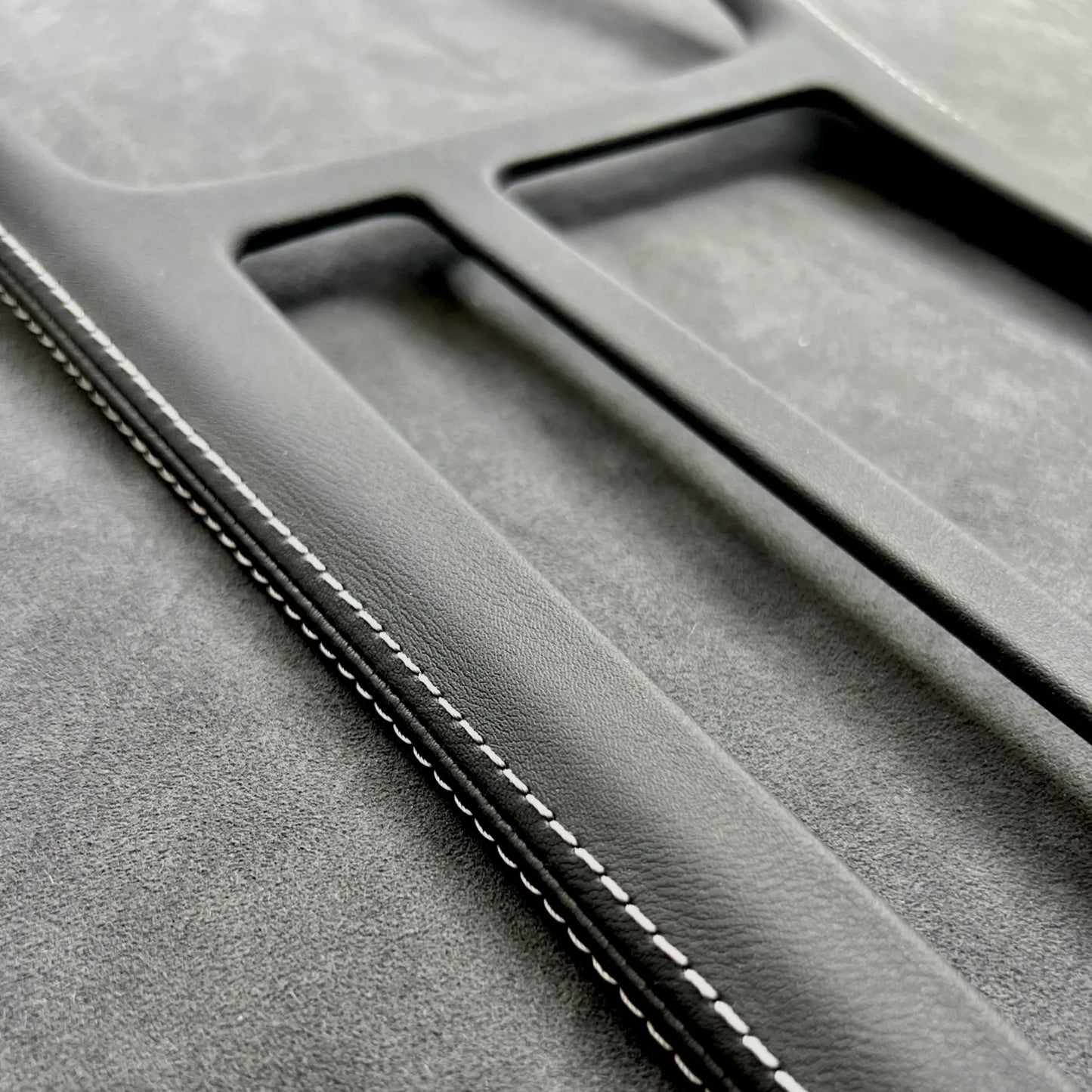 Precision-fit Golf MK7.5 R leather gear shift panel cover with motorsport-inspired blue stitching, OEM-quality interior upgrade.