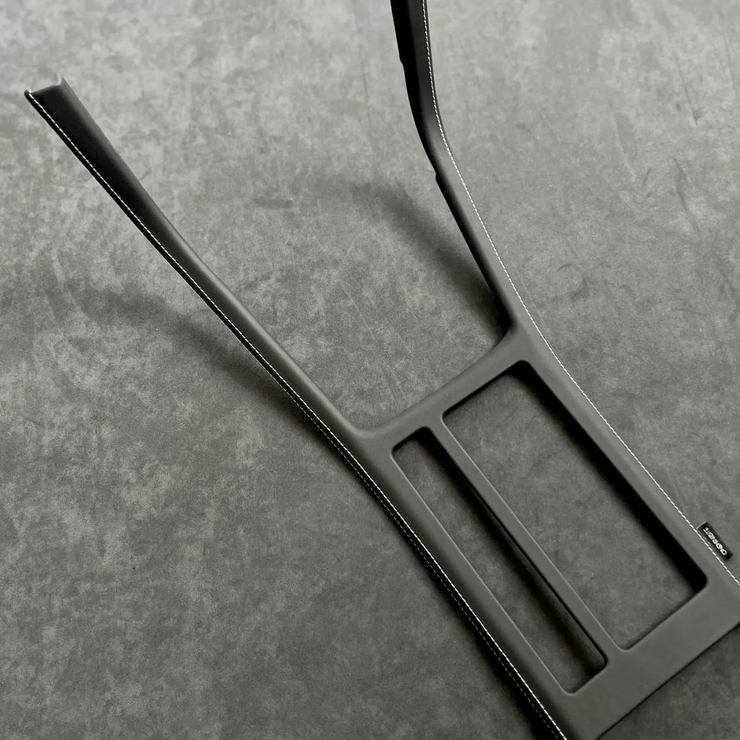 Made-to-order Golf MK7/7.5 CS custom gear shift panel cover in Alcantara or leather, enhancing console style and durability.