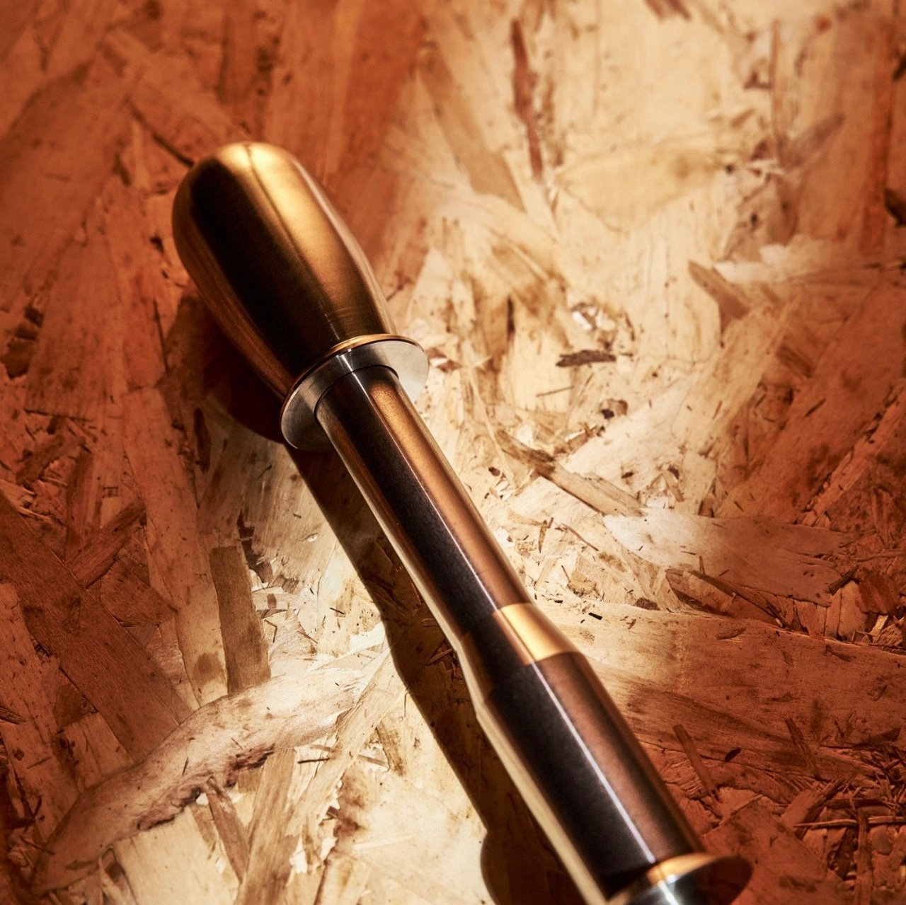 Close-up of the MINI Cooper long shifter extension, highlighting its premium aluminum construction and matte finish.