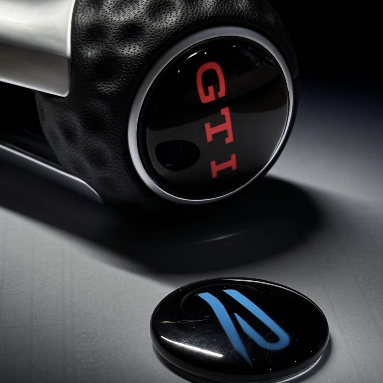Close-up of gear knob extension installed in VW Golf MK8 R showcasing precise fit and sporty upgrade