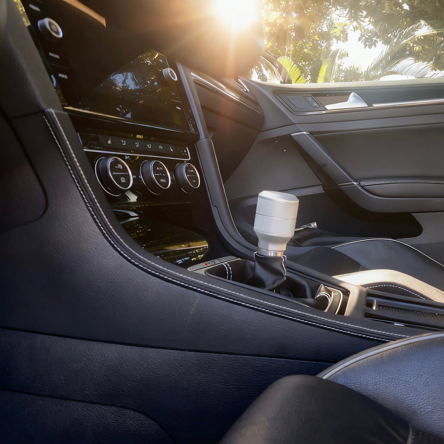 Close-up of VW Golf R MK7 / MK7.5 gear shift panel cover in Alcantara, showing precision stitching and OEM-quality fit.