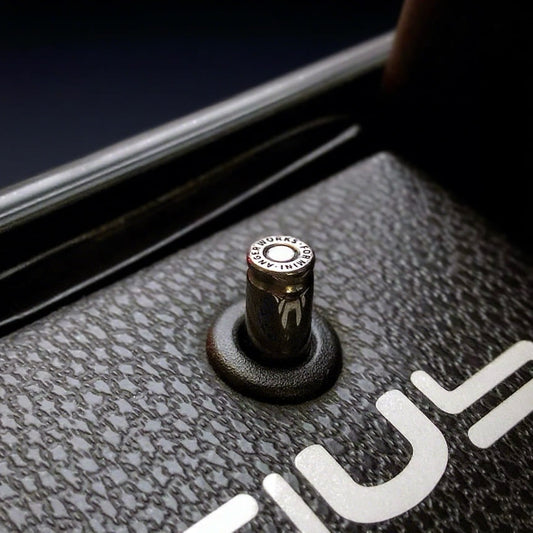 Bullet-inspired metal door lock pin – custom aftermarket part for MINI Cooper R-Series interiors