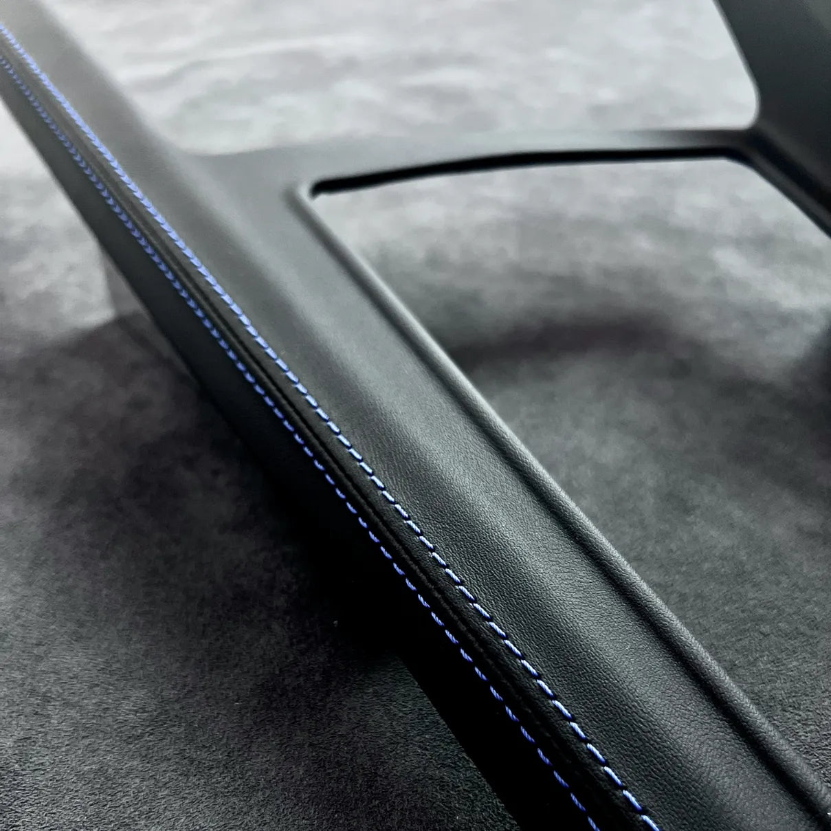 R model gear shift panel cover with blue stitching for Golf MK8 center console, precision fit for a factory-quality look.