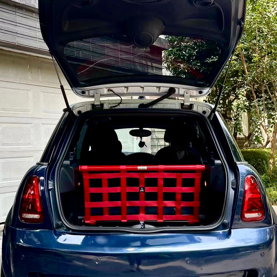 Carbon steel rear strut brace installed in MINI Cooper R53, showing full trunk view and fitment.