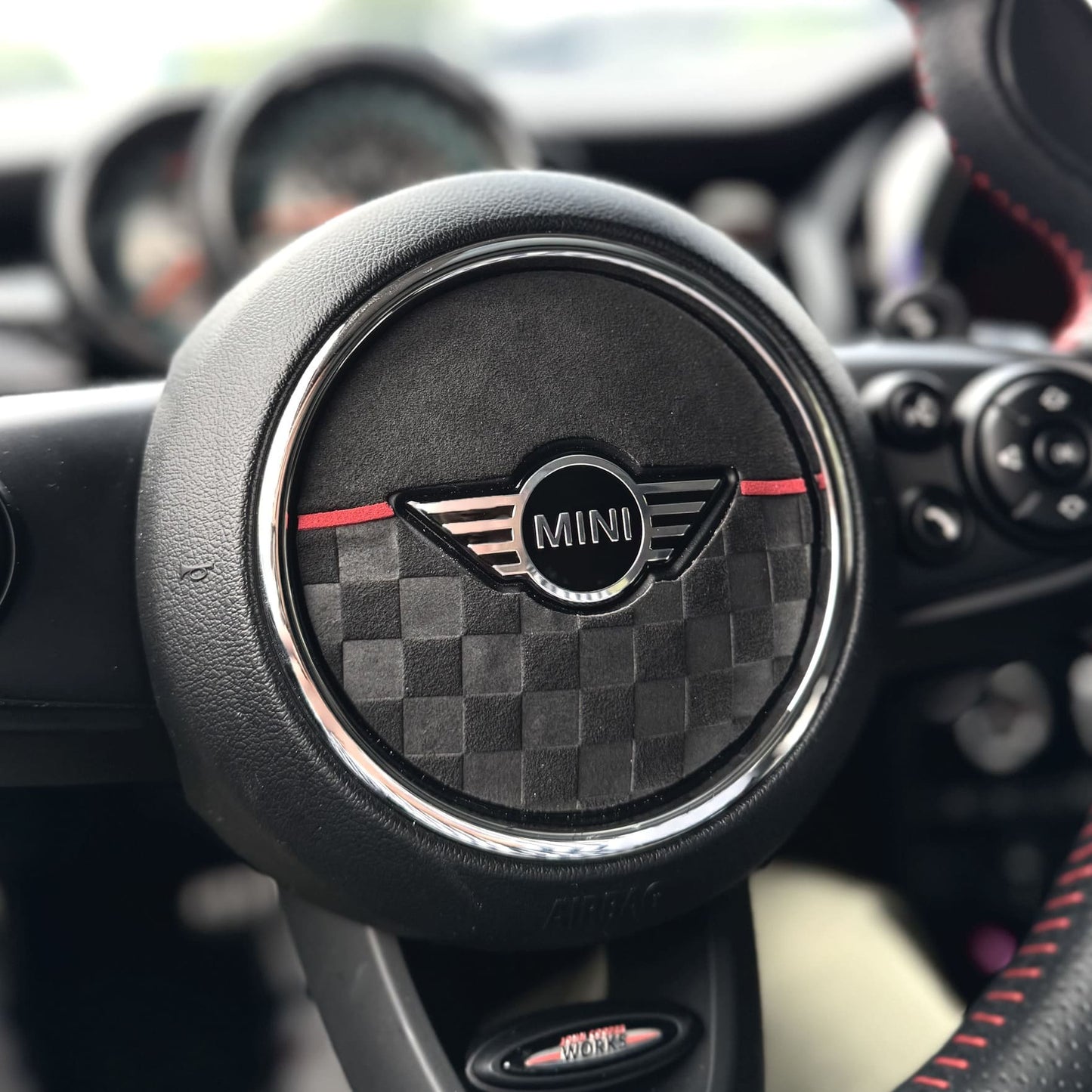 Black Alcantara airbag cover installed on 2015 MINI Cooper F55 interior