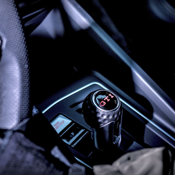 Premium shift knob extension installed on a VW Golf GTI MK8 with DSG transmission
