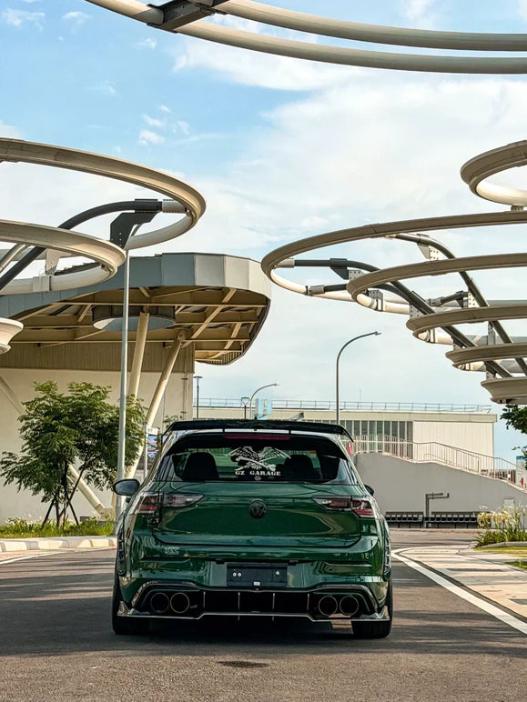 VW Golf 8.5 GTI green direct rear view with adjustable carbon fiber rear spoiler, Swan Neck GT