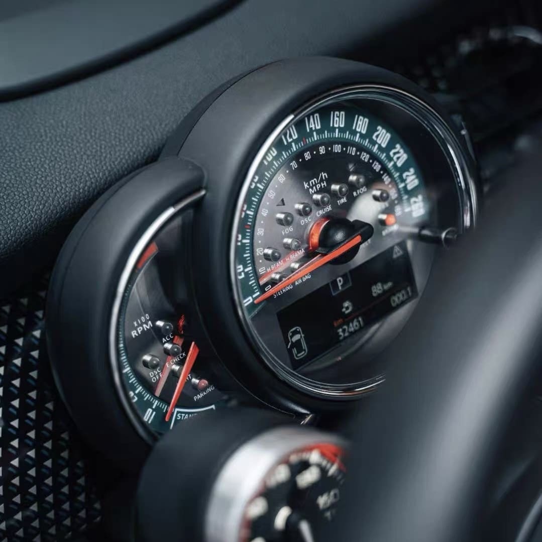 Aftermarket custom MINI Cooper parts for F-Series dashboard upgrade featuring retro racing glow gauge face cluster.
