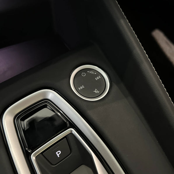 Audi A3 S3 RS3 8Y5 Unibody console cover close-up, edge fit over factory panel — no gaps, piano black covered