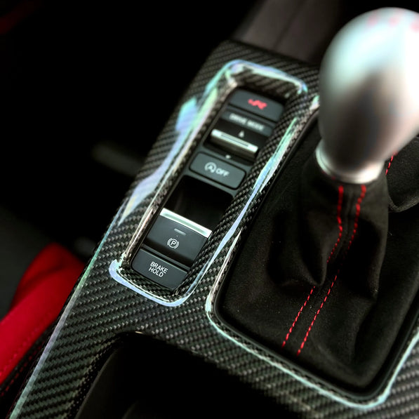 Gloss carbon center console shift panel cover for Honda Civic Type R FL5, direct overlay installation with factory-aligned fit for LHD and RHD manual models.