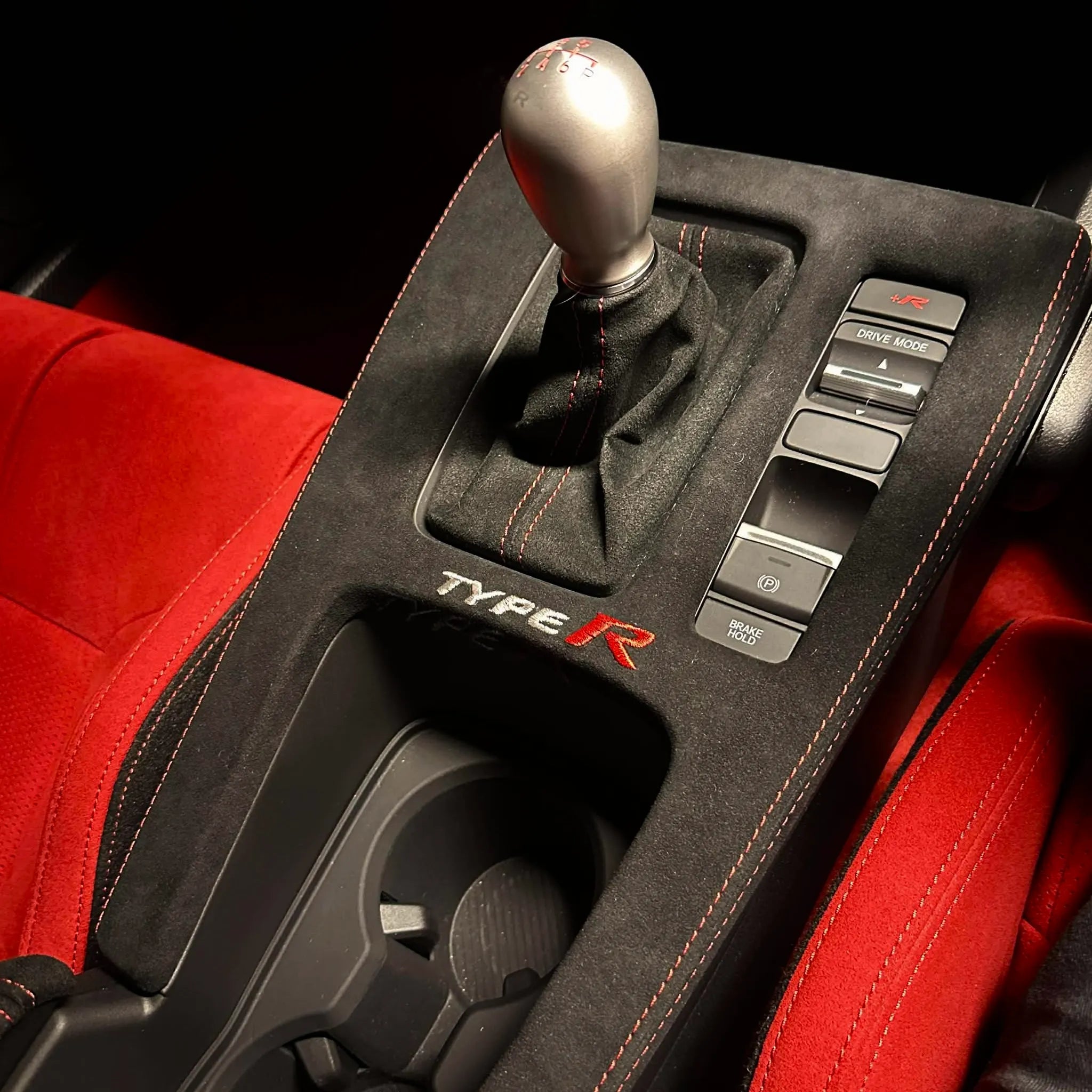 Honda Civic FL5 Type R Alcantara® console cover with red contrast stitching detail