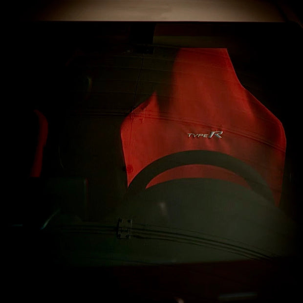 Side profile showing tight fit of seat cover on Civic Type R FL5 front seat