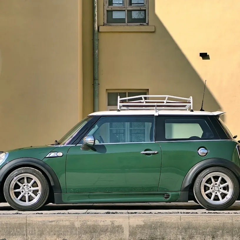 Detailed view of natural wood grain on classic MINI roof rack slats.