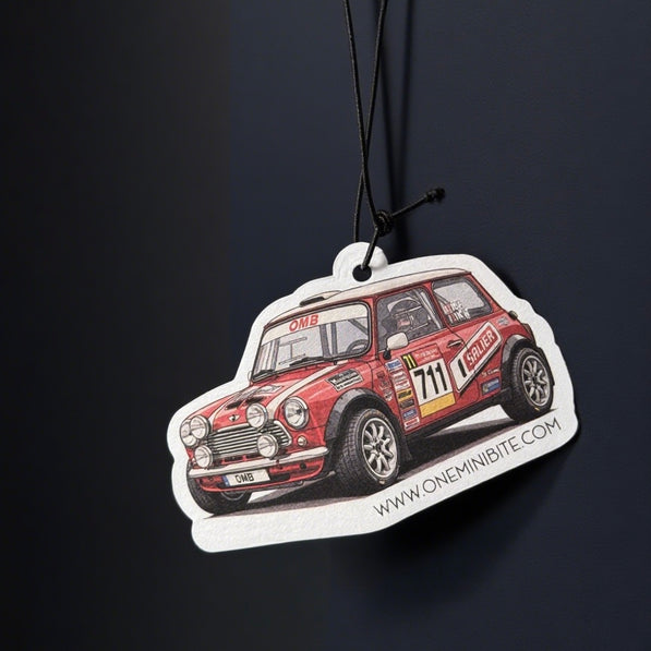Forest-scented rally air freshener hanging from MINI rearview mirror