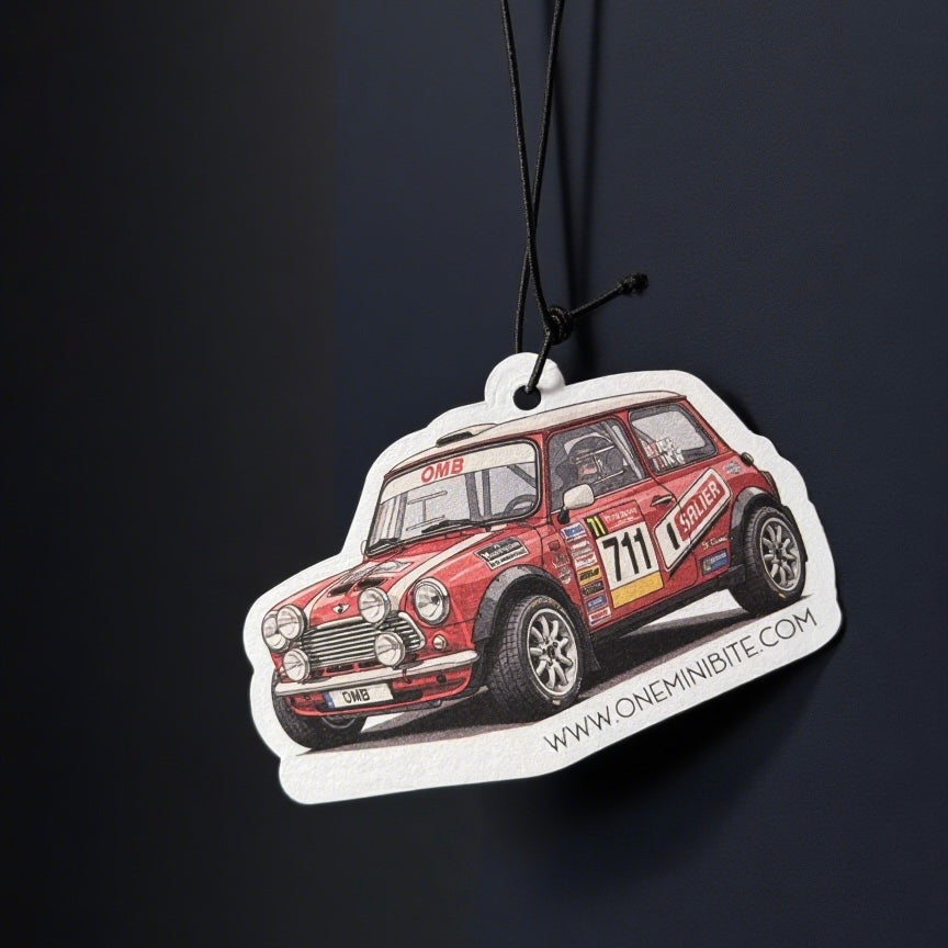 Forest-scented rally air freshener hanging from MINI rearview mirror