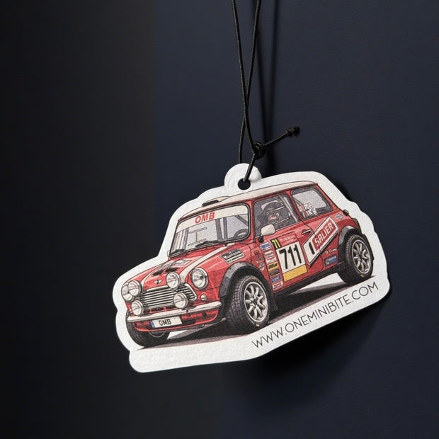 Forest-scented rally air freshener hanging from MINI rearview mirror