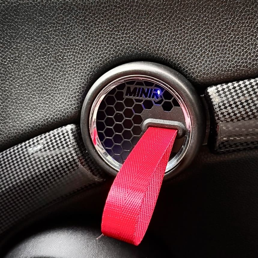 Premium red leather RS-style handle pull strap on MINI Cooper R57 interior door.
