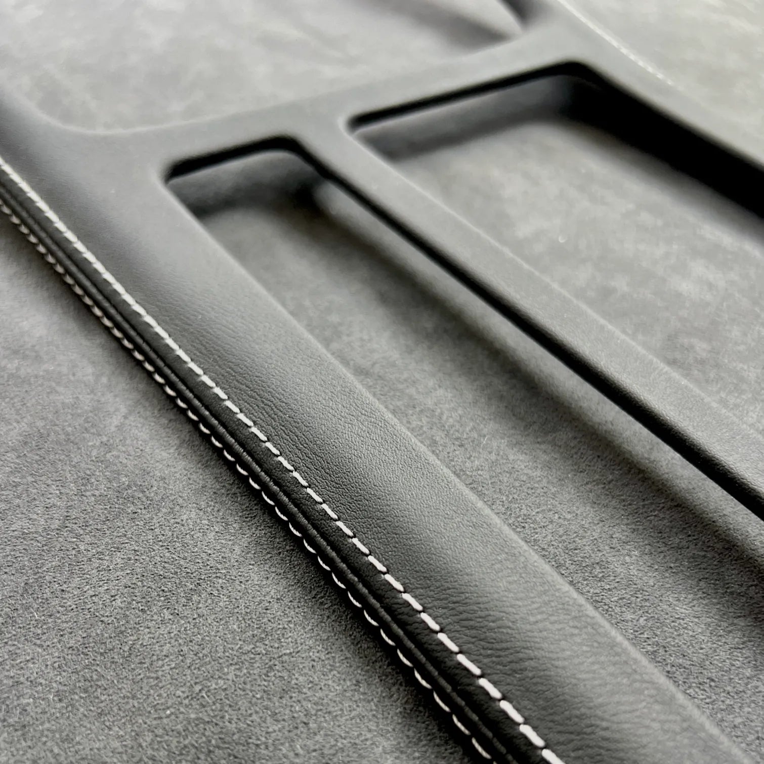 Precision-fit Golf MK7.5 R leather gear shift panel cover with motorsport-inspired blue stitching, OEM-quality interior upgrade.