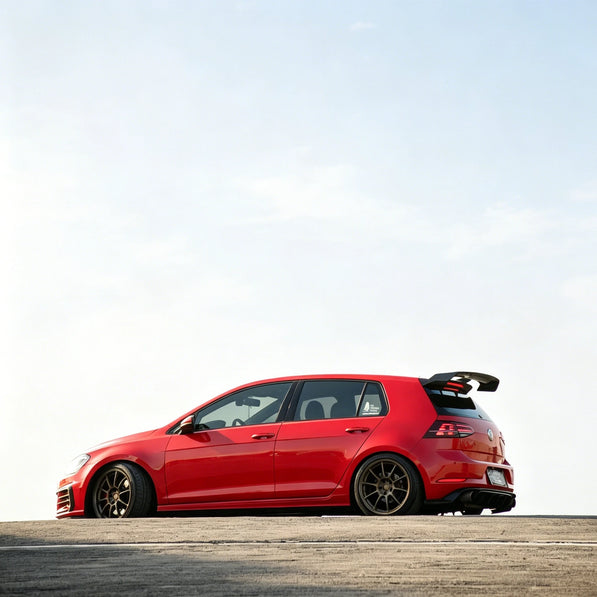 Volkswagen Golf MK7 GTI with OneMiniBite rear spoiler viewed from the rear on the road
