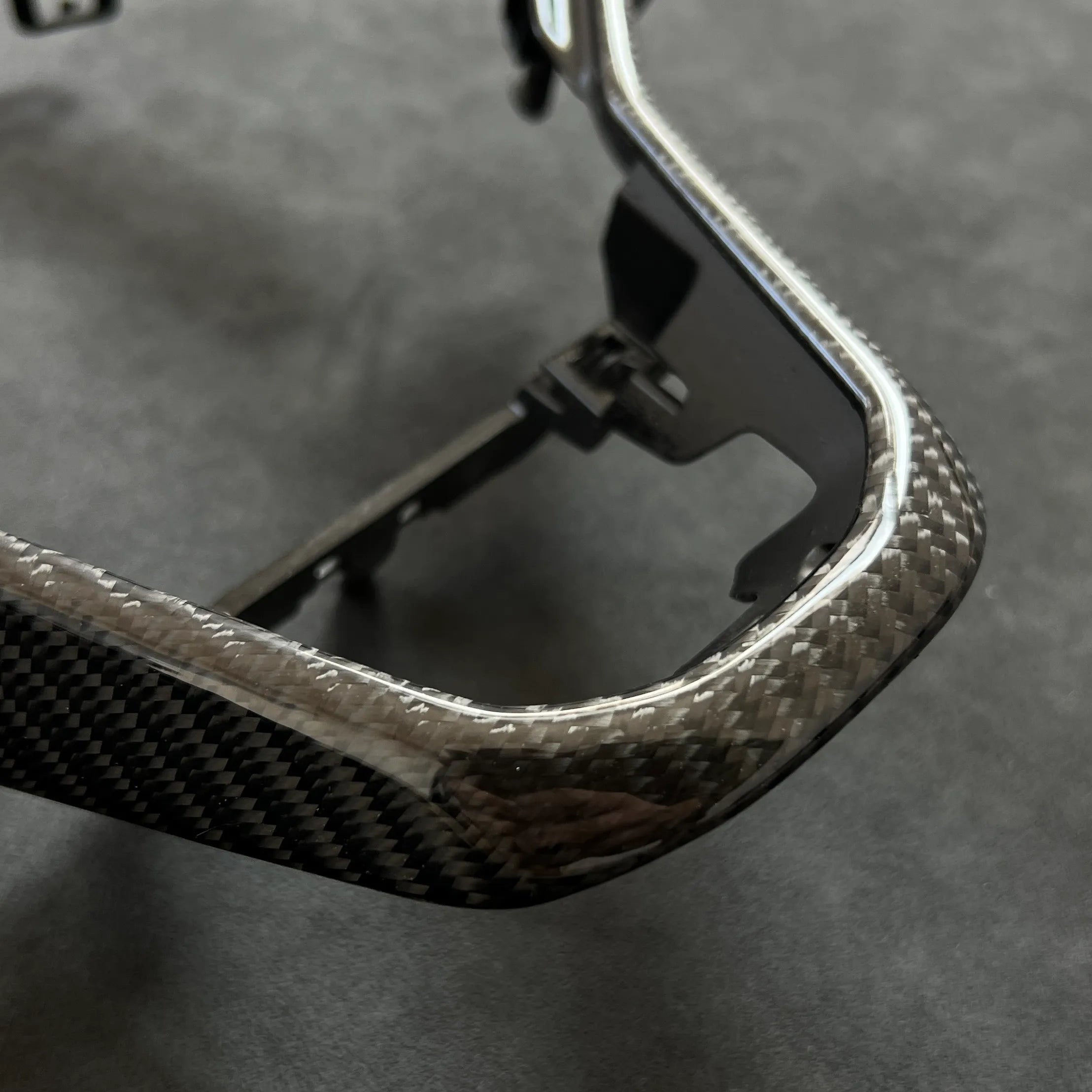 Real carbon fiber steering wheel trim for VW Golf MK8.5 GTI, engineered as a direct replacement for factory haptic-control steering wheels.