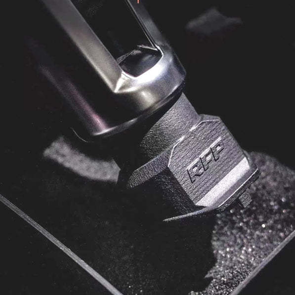 Close-up view of installed shift knob upgrade in Golf MK8