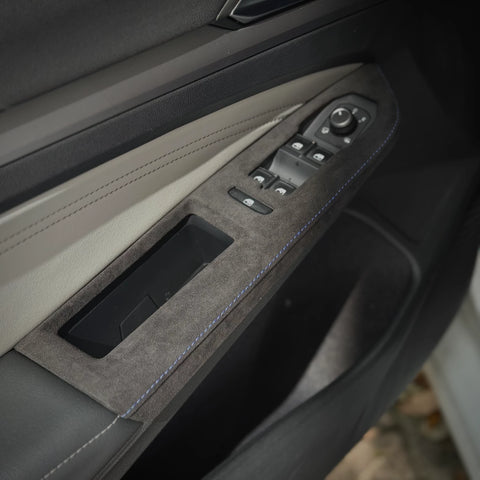 Close-up of Alcantara and semi-rough leather door control panel cover texture for VW Golf Mk8 interior upgrade