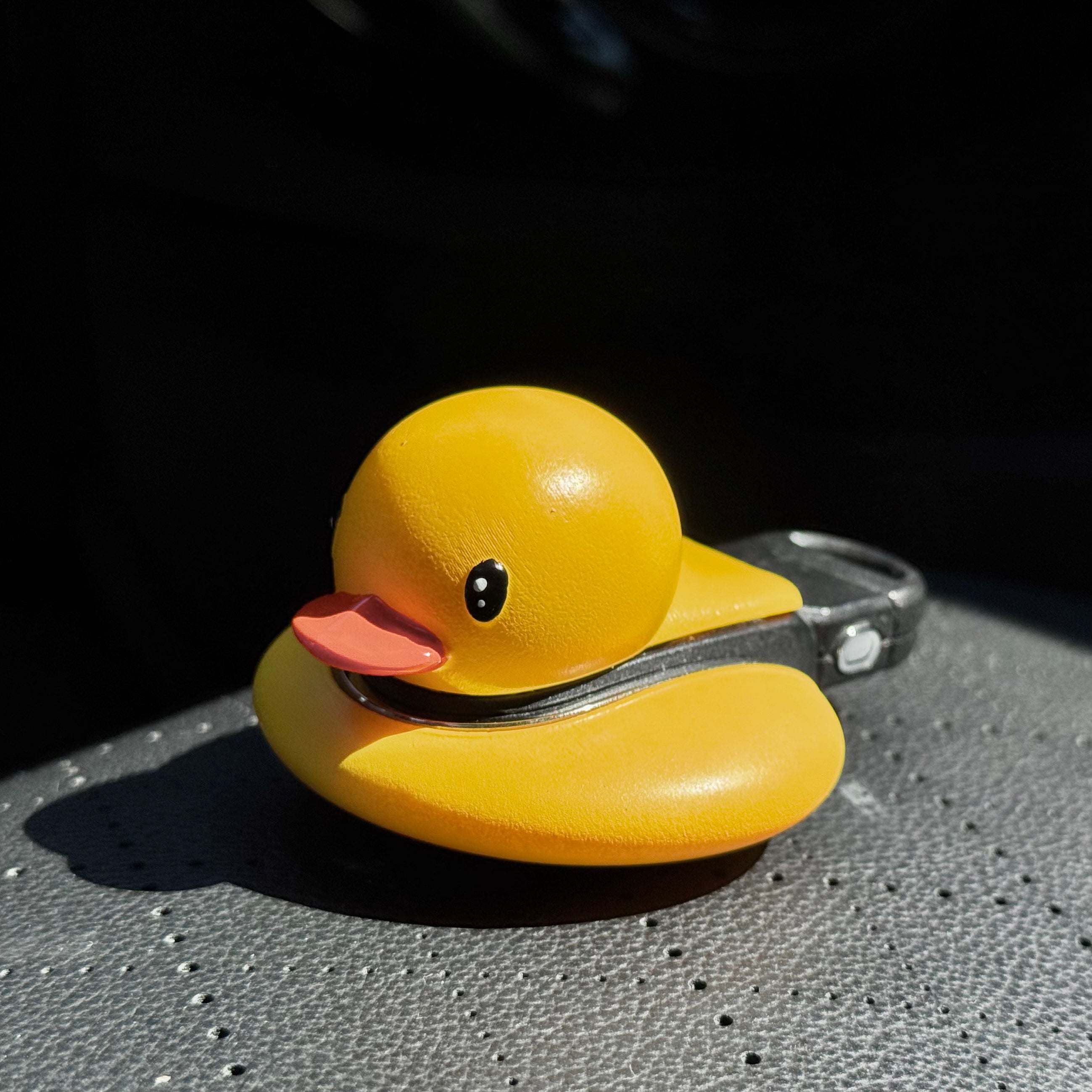 Close-up of handmade yellow duck MINI Cooper key fob cover texture and glossy finish, precision-crafted for F-Series keys.