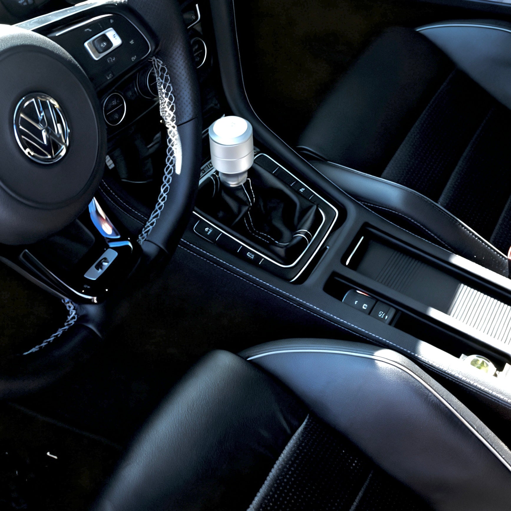 Artisan-crafted VW Golf R MK7 / MK7.5 gear shift panel cover handmade in Alcantara with blue stitching, designed for OEM-quality interior upgrade.