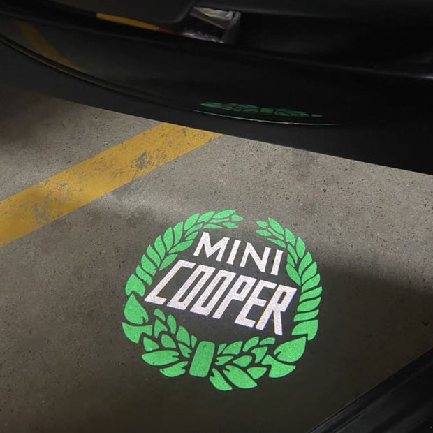 Classic MINI Cooper laurel projection under F57 convertible, twilight setting