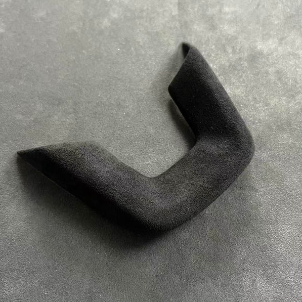 Hand-wrapped Alcantara steering wheel bottom trim for the Honda Civic FL5 Type R, designed to replace the factory plastic triangle and complete the OEM+ suede interior look.