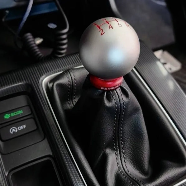 CNC-machined shift boot retainer for Honda manual transmission gear knobs