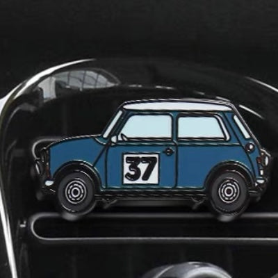  Sky blue air freshener installed in a MINI Cooper, creating a fresh and modern look.