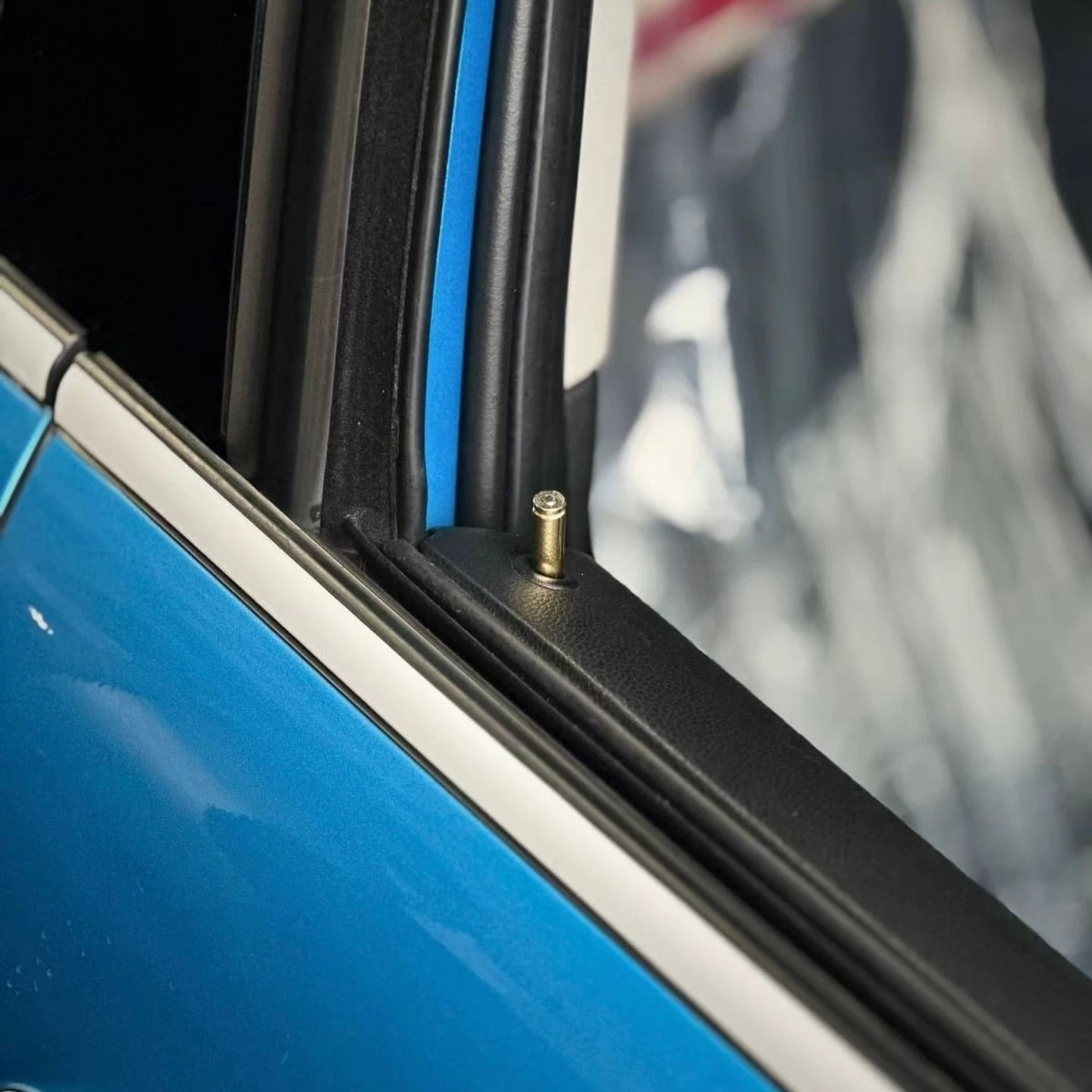 Angled view of the bullet-inspired door lock pin, demonstrating its compatibility with F-Series models.
