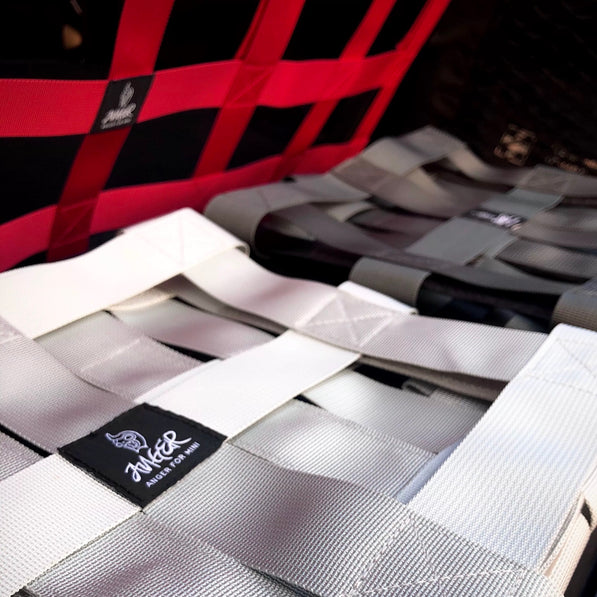 Close-up of the MINI Cooper cargo racing net, highlighting its high-quality nylon webbing and durable construction.