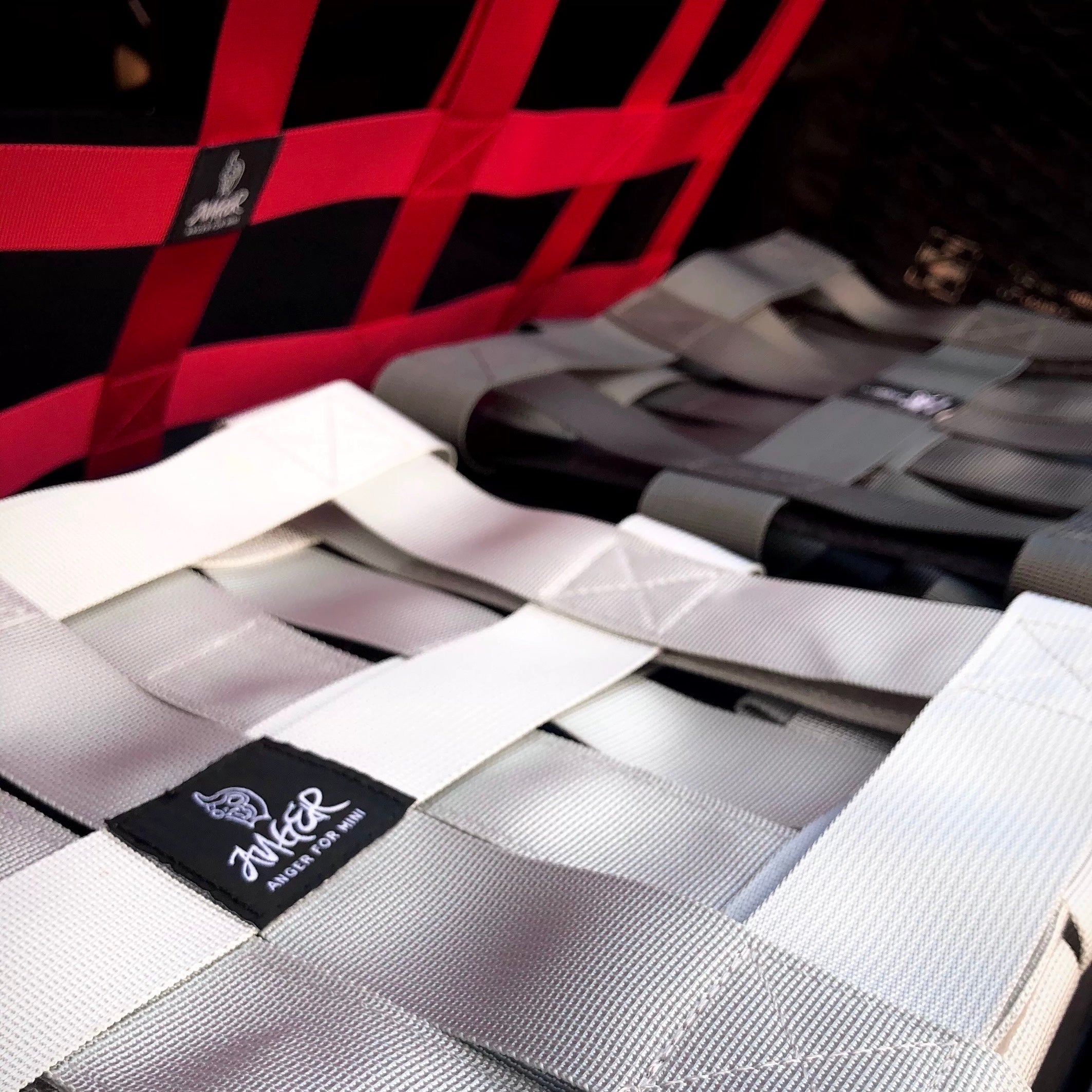 Close-up of the MINI Cooper cargo racing net, highlighting its high-quality nylon webbing and durable construction.