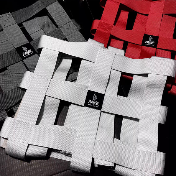 Detailed view of the quick-release buckles on the MINI Cooper cargo net, showcasing its easy installation and removal.