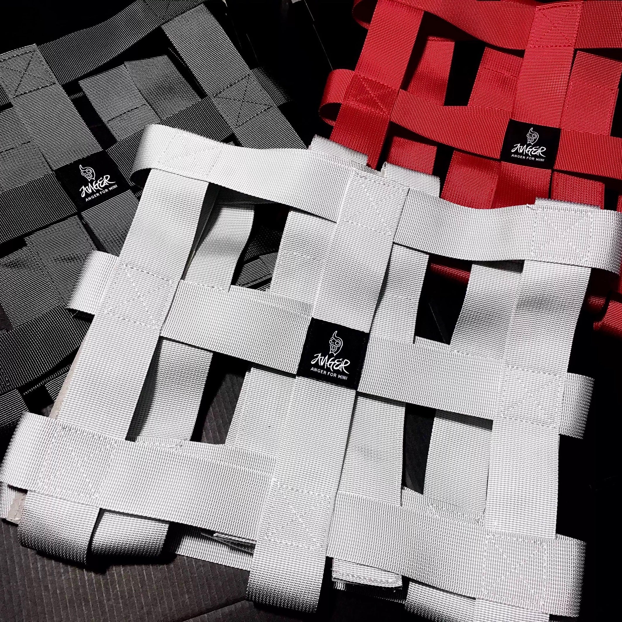 Detailed view of the quick-release buckles on the MINI Cooper cargo net, showcasing its easy installation and removal.