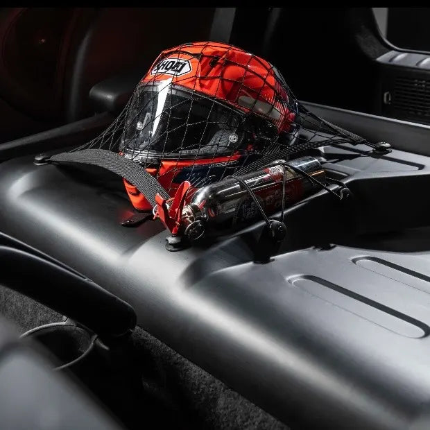 MINI Cooper R56 track interior delete, helmet secured in seat well