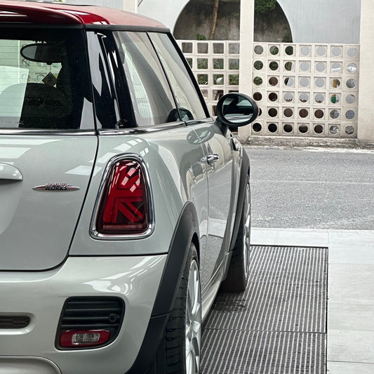 MINI Cooper R56 with a 10mm wheel spacer installed, showcasing improved stance and wheel alignment.