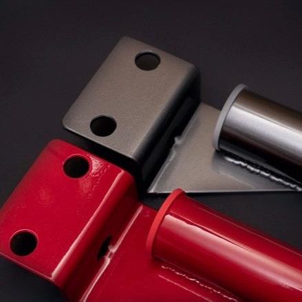 Close-up of the TIG-welded joints on the rear strut brace, showcasing its durability and strength.