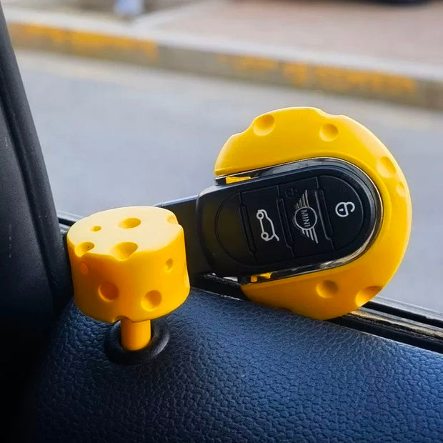 Cheese door lock pin installed in a MINI Countryman, adding a fun touch to the interior.