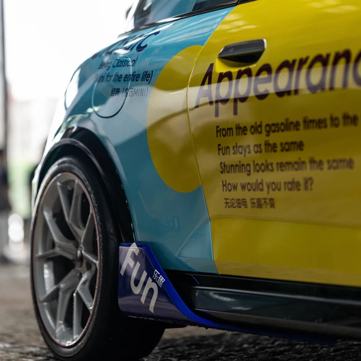 MINI J01 Cooper Electric Gen 4 with carbon splitter, skirts, and spoiler installed
