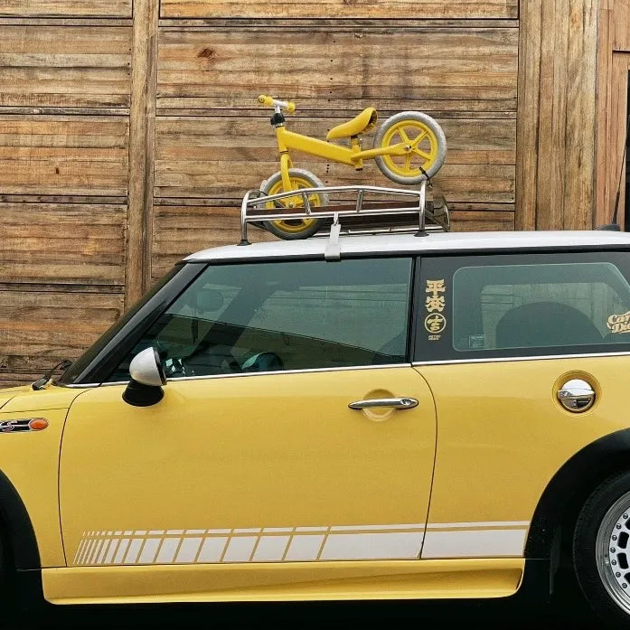 Custom roof rack for MINI R50 with solid wood panels and retro stainless frame.