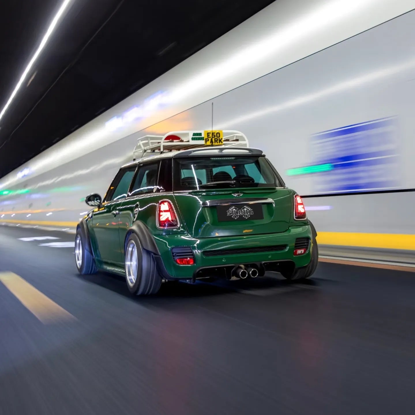 Made-to-order roof rack for F56 Hatch MINI featuring custom-fit design and natural wood grain slats.