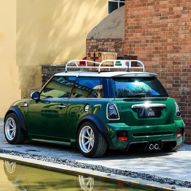 Rear angle of MINI R56 with classic wood roof rack installed.