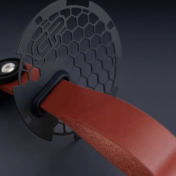 MINI Cooper R56 door panel showing motorsport-style red handle pull RS strap.