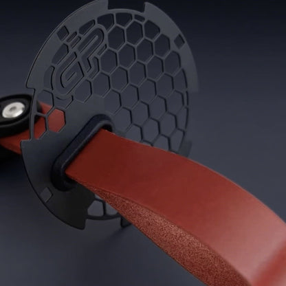 MINI Cooper R56 door panel showing motorsport-style red handle pull RS strap.